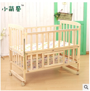 简易多功能实木婴儿床可变书桌摇篮床 送蚊帐带滚轮包邮多用途