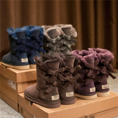 2015冬季新款羊皮毛一体灯芯绒蝴蝶结中筒雪地靴女保暖靴1005532